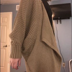 A beige oversized sweater